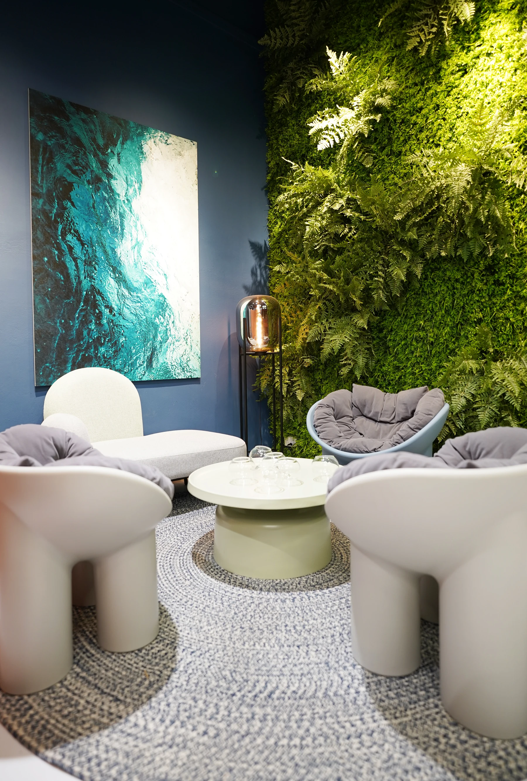 Custom printed acoustic wall panel combined with an artificial green wall